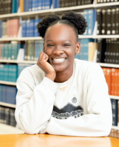 Dillard University student sitting in library