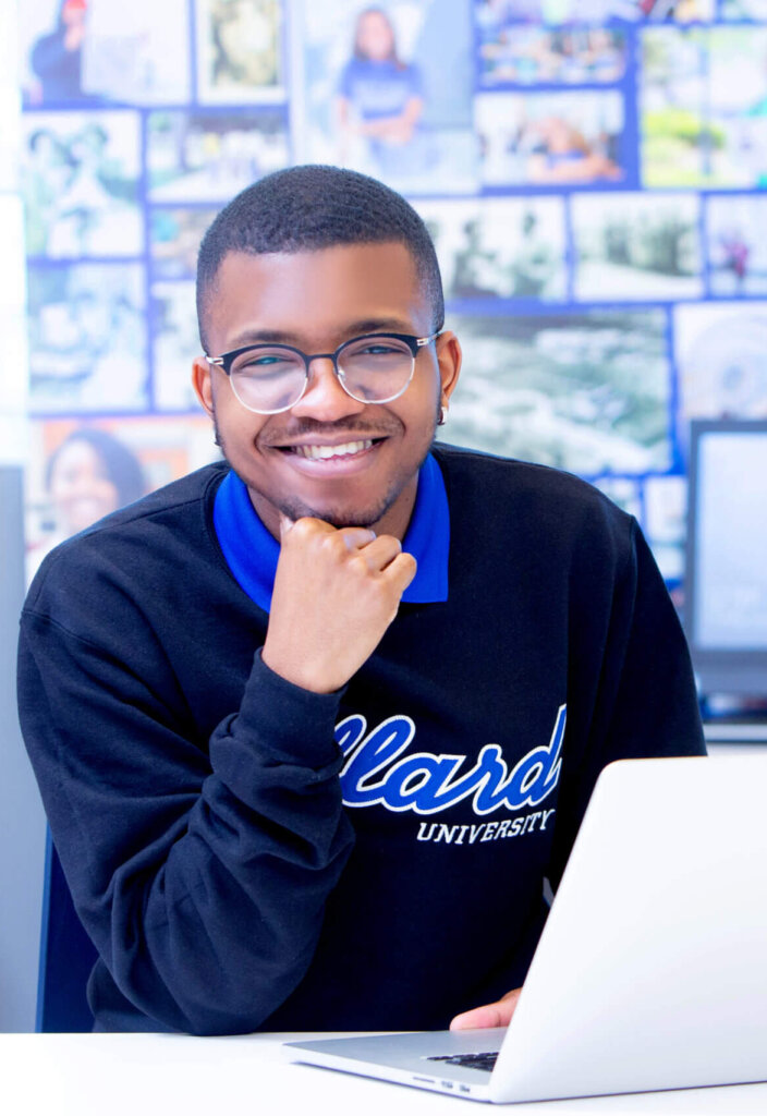 Dillard University student with laptop