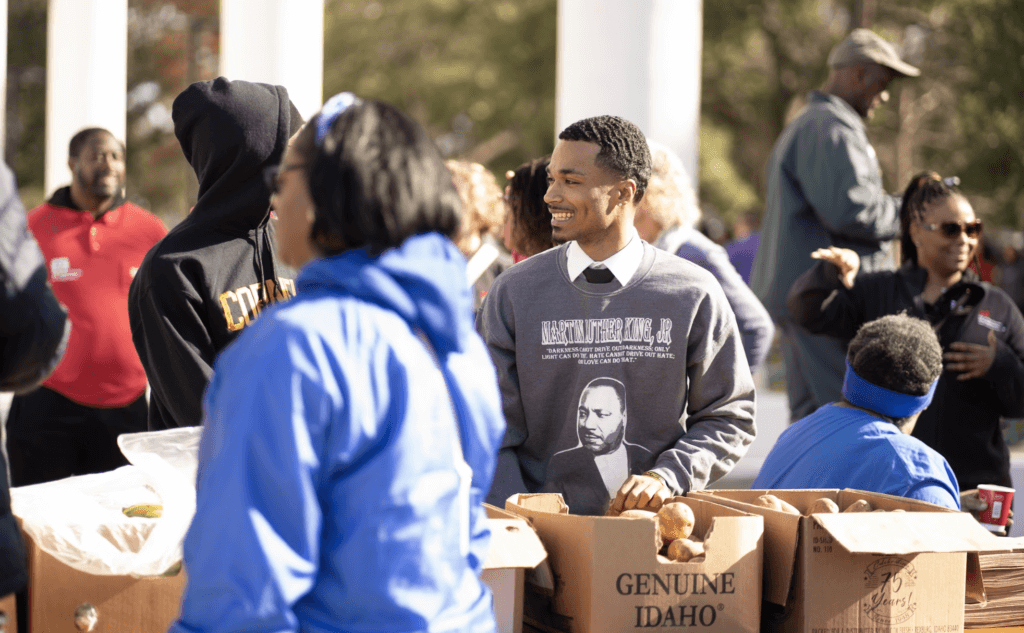 MLK Day of Service - Dillard University Student handing out food
