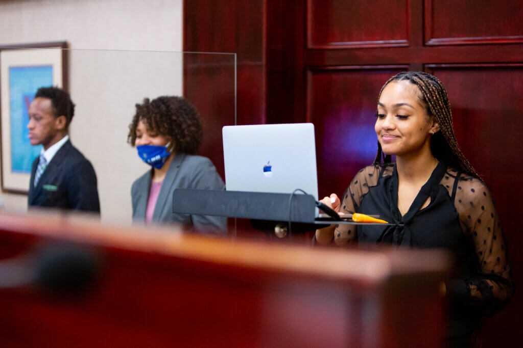 Dillard University students in classroom with computer