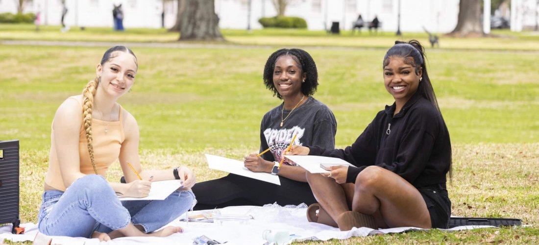 Students sitting on campus