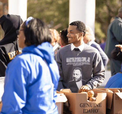 MLK Day of Service - Dillard University Student handing out food